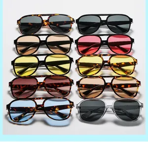 Detailed collection of double-bridge aviator sunglasses in multiple frame and lens colors
