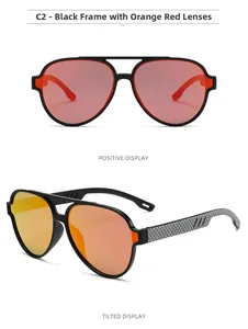 Détail de lunettes aviateur avec branches texture carbone et verres dégradés orange
