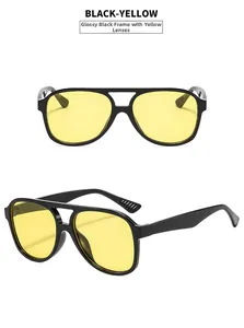 Detail of aviator sunglasses featuring glossy black frames and bright yellow lenses