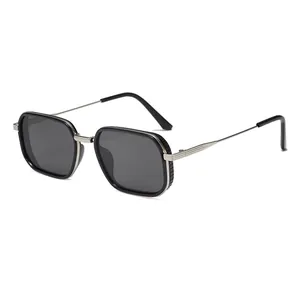 Fashionable square metal sunglasses with black frames and silver accents for street style