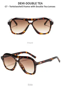 Close-up of tortoise shell aviator sunglasses with gradient tea lenses and double bridge