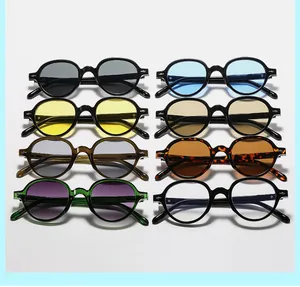Collection of retro round sunglasses in eight varied frame colors and tinted lenses