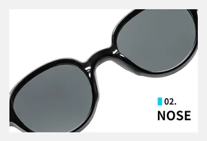 Detail of the integrated nose pads on black vintage sunglasses with smooth glossy finish