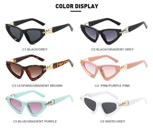 Detailed color display of cat-eye sunglasses with golden chain metal arrow temples
