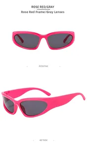 Gafas de sol deportivas rosa con lentes grises vistas de frente y desde un ángulo lateral