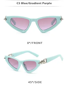 Close-up of cat-eye sunglasses with blue frames, gradient purple lenses and metal arrow hinges