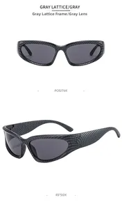 Detalle de gafas de sol deportivas con montura de fibra de carbono gris y lentes oscuras