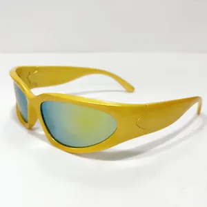 Detail view of bright yellow aerodynamic sports sunglasses with reflective gradient lenses