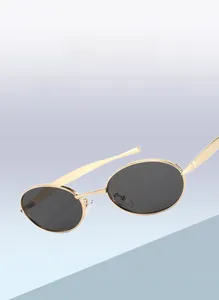 Detailed top view of retro oval metal sunglasses with gold frame and premium lenses