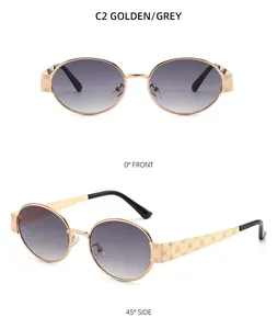 Détail de lunettes de soleil ovales dorées avec relief de rose vintage sur les branches
