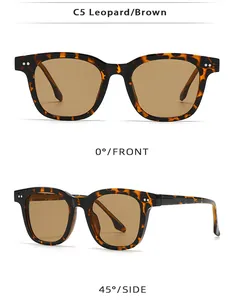 Detail view of leopard print square sunglasses with brown lenses and metal rivet accents