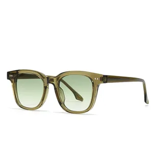 Retro square sunglasses with olive green transparent frames and gradient lenses