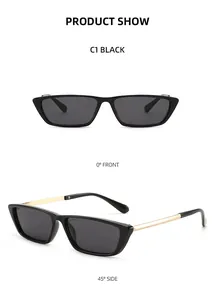 Dettaglio di occhiali da sole cat-eye neri con stanghette in metallo dorato