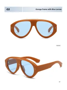 Dettaglio degli occhiali aviator C2 con montatura arancione e lenti blu frontali e a 45 gradi