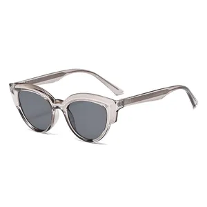 Chic TR90 cat-eye sunglasses with transparent grey frames and dark grey lenses for women