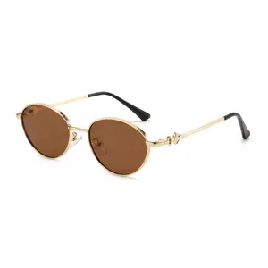 Classic oval sunglasses with gold metal frame and dark brown lenses in a retro style
