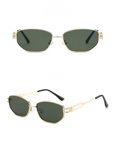 Detail view of gold metal sunglasses with green lenses and unique hollow out temples