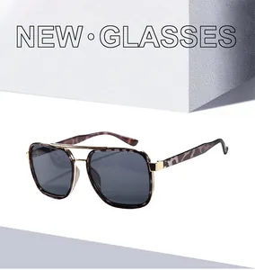 Detail of vintage square oversized sunglasses with tortoiseshell frame and metal bridge