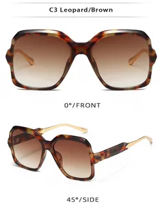 Detail view of leopard print square sunglasses with brown gradient lenses and gold temples