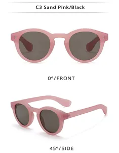 Front and side view of round sand pink matte sunglasses with gray lenses and metal rivets
