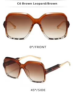 Detail view of square leopard print sunglasses with gradient brown lenses and gold metal temples