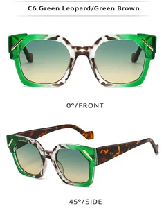 Vue détaillée de lunettes œil-de-chat imprimé léopard vert avec détails métalliques