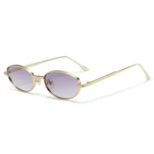 Retro steampunk oval metal sunglasses with gold textured frames and purple gradient lenses