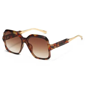 Vintage tortoiseshell square frame sunglasses with gold metal temples and gradient lenses