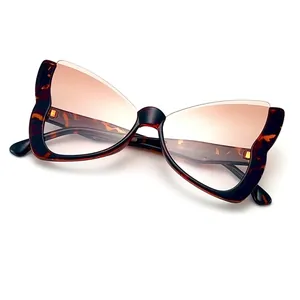 Fashionable butterfly-shaped tortoise shell sunglasses with brown gradient lenses