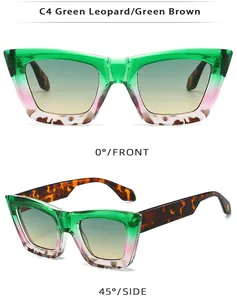 Detail view of square oversized sunglasses with green leopard frame and gradient lenses