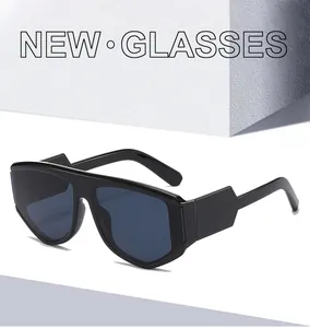 Detail of fashion square sunglasses featuring bold geometric thick temples and dark lenses