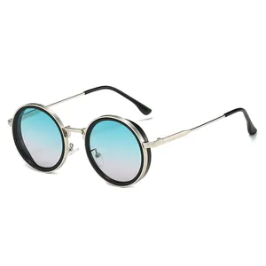 Lunettes de soleil rondes rétro avec monture dorée et verres dégradés bleu-violet