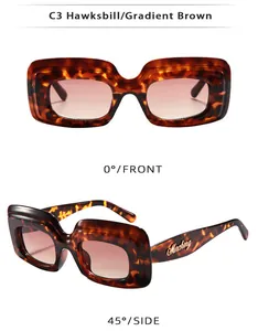 Détails macro de lunettes de soleil rectangulaires écaillées avec verres dégradés marron
