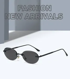 Close-up of retro oval rimless sunglasses with black metal temples and soft nose pads