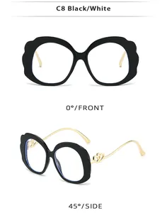 Detailed front and side views of oval sunglasses with heart-shaped metal temple accents