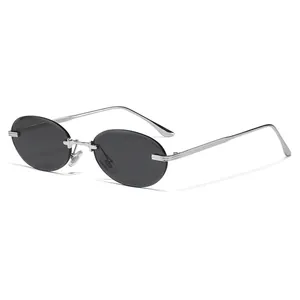 Oval rimless sunglasses with grey lenses and silver metal temples for fashion eyewear