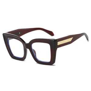 Fashionable oversized square burgundy sunglasses with decorative gold metal side temples