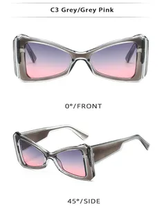 Détail de lunettes de soleil œil de chat avec monture grise et verres dégradés rose-violet