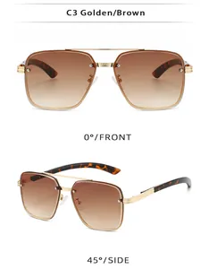 Macro view of golden double-bridge aviator sunglasses with brown gradient lenses