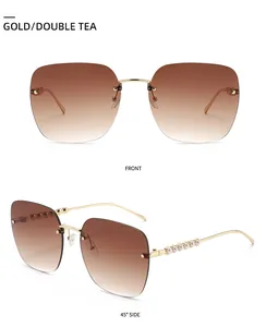 Détail de lunettes de soleil sans monture dorées avec verres dégradés et branches en perles