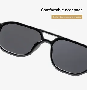 Close-up of integrated comfortable nose pads on black aviator sunglasses for pressure relief