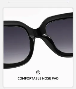 Detail of comfortable nose pads on black square frame sunglasses with gradient lenses