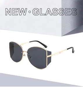 Detailansicht der goldenen Metallsonnenbrille mit Seitenschutz und grauen Gläsern