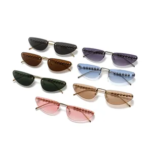Fashion cat-eye metal sunglasses with pearl accents and gradient lenses for women