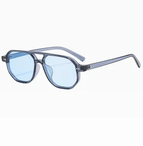 Detail of light blue lenses and grey transparent double bridge aviator sunglasses