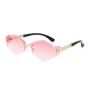 Frameless heart shaped sunglasses with pink gradient lenses and gold metallic temples