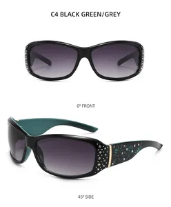 Detail view of fashion oversized sunglasses with rhinestone decor and floral temple pattern
