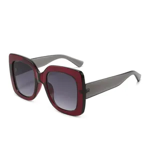 Retro square oversized sunglasses in burgundy and gray with gradient lenses 45-degree view