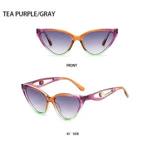 Detail view showing cat-eye sunglasses with gradient frames and pearl accents on temples