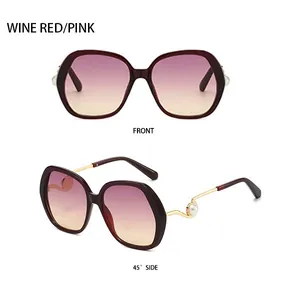 Detailed front and 45-degree side views of wine red gradient oversized sunglasses